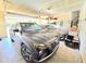 Spacious two-car garage with ample storage and parking space for vehicles at 171 Shaker Hollow Drive Dr, Mcdonough, GA 30253