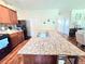 Kitchen island featuring a dual sink, granite countertop, and seating on the far side at 171 Shaker Hollow Drive Dr, Mcdonough, GA 30253