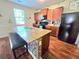 Charming kitchen features granite countertops, stainless steel appliances, and modern backsplash at 171 Shaker Hollow Drive Dr, Mcdonough, GA 30253