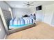 Spacious main bedroom with neutral carpet, ceiling fan, and ample natural light at 171 Shaker Hollow Drive Dr, Mcdonough, GA 30253