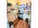 Walk-in pantry with well-stocked shelves and laminate floors provides ample storage space at 171 Shaker Hollow Drive Dr, Mcdonough, GA 30253
