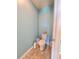 Small powder room featuring neutral finishes and tiled flooring at 171 Shaker Hollow Drive Dr, Mcdonough, GA 30253
