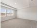 Spacious carpeted bedroom with large windows providing natural light at 237 Arwen Drive Lot 61, Mcdonough, GA 30252