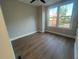 Cozy bedroom with hardwood floors, natural light and a ceiling fan at 970 Bibbs Circle Nw # 12, Atlanta, GA 30318