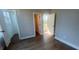 Spacious bedroom with hardwood floors and neutral paint, providing a bright and airy atmosphere at 970 Bibbs Circle Nw # 12, Atlanta, GA 30318