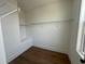 Walk-in closet with hardwood floors and wire shelving for organized storage at 970 Bibbs Circle Nw # 12, Atlanta, GA 30318