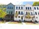 Charming townhomes feature modern design, balconies, and beautifully landscaped front yards at 970 Bibbs Circle Nw # 12, Atlanta, GA 30318