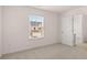 Bedroom with natural light, window, and door to bathroom at 235 Silver Moon Dr, Loganville, GA 30052