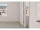 Bedroom with natural light, window, and door to bathroom at 235 Silver Moon Dr, Loganville, GA 30052