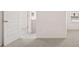 Spacious bedroom with neutral carpet, white trim and doors offers a serene retreat at 235 Silver Moon Dr, Loganville, GA 30052
