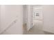 Hallway leading to bedroom and storage space at 235 Silver Moon Dr, Loganville, GA 30052