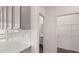 Kitchen with stylish cabinets, subway tile backsplash, quartz countertops, and stainless steel appliances at 235 Silver Moon Dr, Loganville, GA 30052