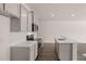 Stylish kitchen with center island, stainless steel appliances, and quartz countertops at 235 Silver Moon Dr, Loganville, GA 30052
