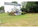Backyard view with patio, gazebo, outdoor furniture and lush landscaping, creating a relaxing outdoor living space at 3824 Smith Creek Ct, Buford, GA 30519