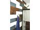 Unique bathroom with multi-toned wood paneling and a shower with a black frame at 3824 Smith Creek Ct, Buford, GA 30519