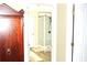 A bathroom glimpse through a door, featuring a glass shower with gray subway tile at 3824 Smith Creek Ct, Buford, GA 30519