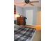 Comfortable bedroom with a ceiling fan and a view of the closet and door at 3824 Smith Creek Ct, Buford, GA 30519
