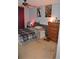 Nicely decorated bedroom with a ceiling fan, chest of drawers, and themed decor at 3824 Smith Creek Ct, Buford, GA 30519