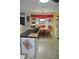 Dining area with wood table set and bay window that provides natural light at 3824 Smith Creek Ct, Buford, GA 30519