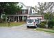 Beautiful two-story brick home featuring an attached garage, well-kept lawn, and mature landscaping at 3824 Smith Creek Ct, Buford, GA 30519