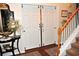 Elegant foyer featuring stylish decor, a staircase, and an open view of the interior at 3824 Smith Creek Ct, Buford, GA 30519