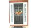 Close up of front door decorated with flower decor, complemented by sidelights and brickwork at 3824 Smith Creek Ct, Buford, GA 30519