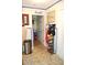 Hallway area featuring decorative accents, white trim, and unique flooring at 3824 Smith Creek Ct, Buford, GA 30519