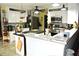 Bright kitchen with granite countertops, white cabinets, and modern appliances for cooking enthusiasts at 3824 Smith Creek Ct, Buford, GA 30519