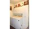 Laundry room featuring Samsung washer and dryer set, along with white cabinets at 3824 Smith Creek Ct, Buford, GA 30519