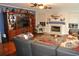 Cozy living room with a fireplace, entertainment center, and comfortable seating for Gathering gatherings at 3824 Smith Creek Ct, Buford, GA 30519