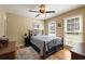 Cozy bedroom with hardwood floors, a double bed, and plenty of natural light at 4249 Arbor Club Dr, Marietta, GA 30066