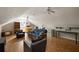 Spacious bonus room with a vaulted ceiling, hardwood floors, and natural lighting at 4249 Arbor Club Dr, Marietta, GA 30066