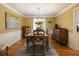 Traditional dining room features hardwood floors, chandelier, and classic decor at 4249 Arbor Club Dr, Marietta, GA 30066