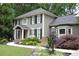 Beautifully landscaped front yard with colorful flowers, stone accents, and a welcoming entrance at 4249 Arbor Club Dr, Marietta, GA 30066