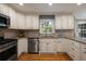 Kitchen features granite counters, stainless appliances, and white cabinets at 4249 Arbor Club Dr, Marietta, GA 30066