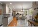 Open concept kitchen with granite counters, stainless appliances, and an eat-in breakfast nook at 4249 Arbor Club Dr, Marietta, GA 30066