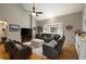 Spacious living room with vaulted ceilings, hardwood floors, and comfortable leather seating at 4249 Arbor Club Dr, Marietta, GA 30066