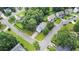 Bird's eye view of a home with mature trees, a gray roof and a well manicured front lawn at 536 Cherokee Overlook Court Ct, Canton, GA 30115