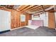 Unfinished basement with a small window, concrete flooring, and exposed insulation at 536 Cherokee Overlook Court Ct, Canton, GA 30115