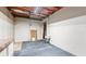Unfinished basement with carpet, exposed ceiling, and a countertop at 536 Cherokee Overlook Court Ct, Canton, GA 30115
