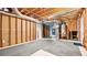 Unfinished basement with a door and exposed insulation at 536 Cherokee Overlook Court Ct, Canton, GA 30115