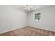 Cozy bedroom featuring carpet, neutral paint, ceiling fan and a window at 536 Cherokee Overlook Court Ct, Canton, GA 30115