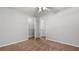 Bedroom with neutral walls, plush carpet, and a closet with shelving at 536 Cherokee Overlook Court Ct, Canton, GA 30115