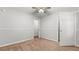Bedroom features neutral paint, and carpet with ceiling fan at 536 Cherokee Overlook Court Ct, Canton, GA 30115