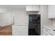 Kitchen area, featuring an open concept to other rooms in the house, new appliances, and modern touches at 536 Cherokee Overlook Court Ct, Canton, GA 30115