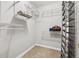Spacious walk-in closet with adjustable shelving and ample storage options at 536 Cherokee Overlook Court Ct, Canton, GA 30115