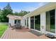 Back deck featuring an outdoor seating area and views of the backyard, ideal for relaxation and entertainment at 145 Deep Step Rd, Covington, GA 30014