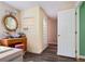 Bathroom featuring a classic vanity and a unique glass block window, offering both privacy and natural light at 145 Deep Step Rd, Covington, GA 30014