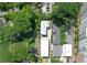 Bird's eye view of a three-story home with parking and trees in an urban setting at 2972 Lookout Ne Pl, Atlanta, GA 30305