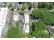 Aerial shot of a well-situated home in a neighborhood filled with mature trees at 2972 Lookout Ne Pl, Atlanta, GA 30305